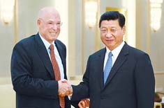 习近平会见美国前财长保尔森