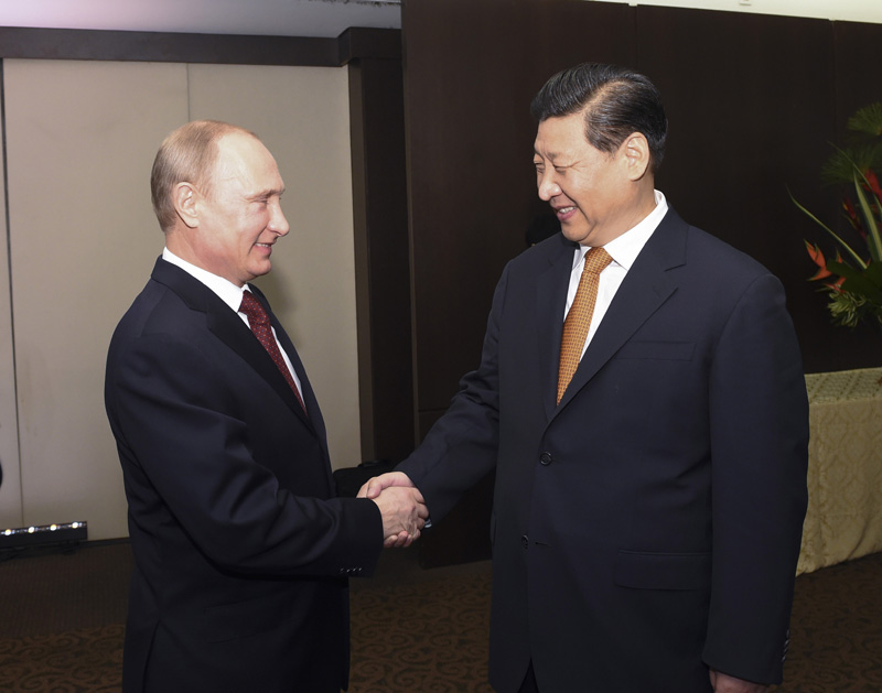 7月14日，国家主席习近平在巴西福塔莱萨会见俄罗斯总统普京。新华社记者李学仁摄