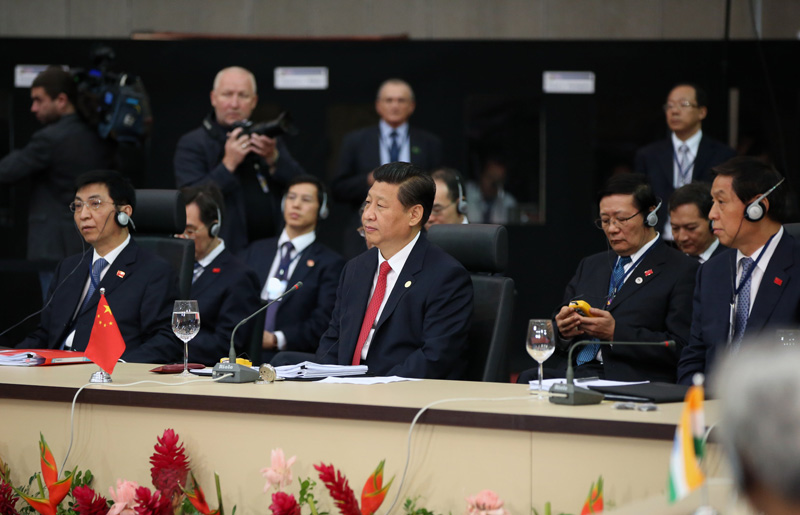 7月15日，国家主席习近平在巴西福塔莱萨出席金砖国家领导人第六次会晤。 新华社记者 兰红光 摄