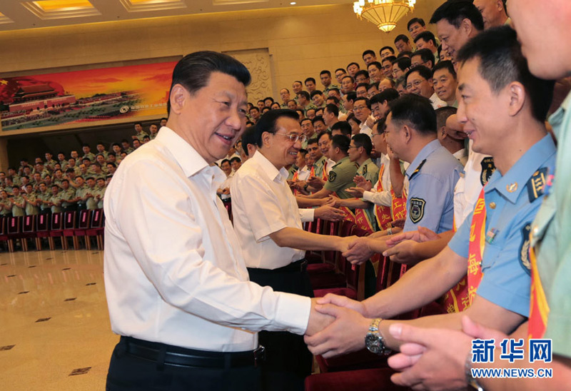 2014年6月27日，习近平、李克强、张高丽等在北京接见第五次全国边海防工作会议全体与会代表。 李刚 摄