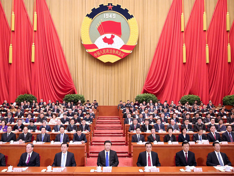 3月3日，中国人民政治协商会议第十二届全国委员会第四次会议在北京人民大会堂开幕。这是习近平、李克强、张德江、刘云山、王岐山、张高丽在主席台就座。　　新华社记者 兰红光 摄