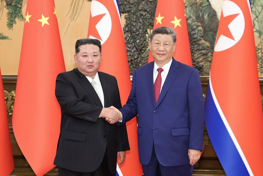 习近平同朝鲜劳动党总书记、国务委员长金正恩举行会谈