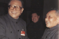 邓小平同江泽民亲切握手
